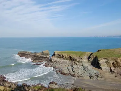 an ocean view of a rocky shoreline with the ocean at Moonraker in Port Isaac