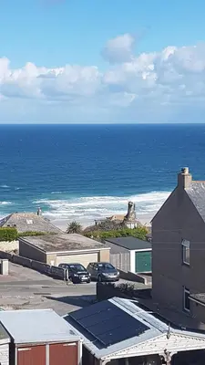 a view of the ocean from the roof of a building at Saltwater in St Ives