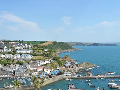 an aerial view of a harbor with boats in the water at Lowenna - Ukc3538 in Mevagissey
