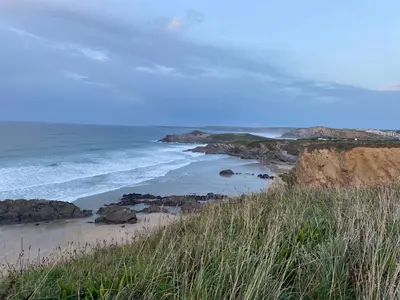 a view of a beach with rocks and the ocean at Ocean View Beach Rd in Newquay