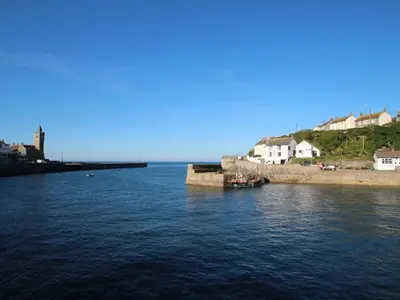 a large body of water with a boat in it at Rosa Cottage in Porthleven