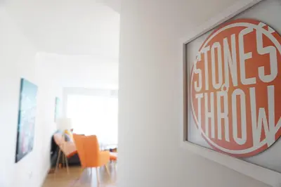a picture of a coke sign on a wall at Stones Throw in Newquay
