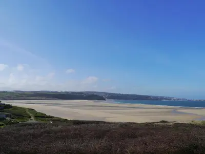a view of a beach with the ocean in the background at Treleigh in Hayle