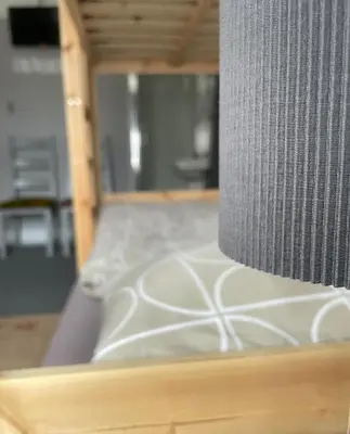 a close up of a bed in a room at Breakers Guest House in Newquay