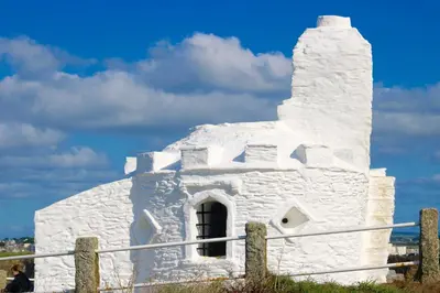 a building covered in snow on top of a field at 29 @ One Lusty Glaze in Newquay