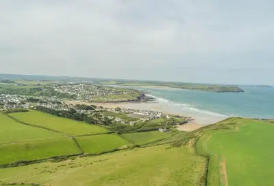 an aerial view of a beach and the ocean at 12 Westward Flats in Polzeath