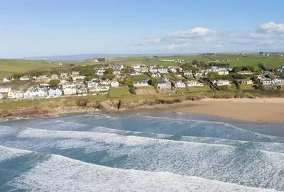 an aerial view of a beach with houses at 4 Pentire Rocks in Polzeath