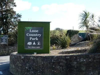 a sign for a loose country park in a park at Polborder Holidays Looe Country Park in Looe