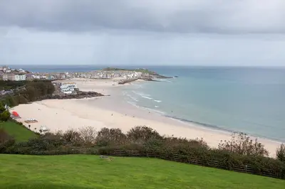 a view of a beach with people on it at Coastguard House in St Ives