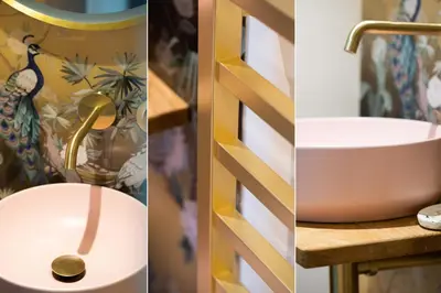 a bathroom remodel with a sink and a gold faucet at Mariner's Belle in St Ives