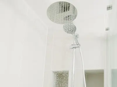 a shower in a bathroom with a shower curtain at 50 Bredon Court in Newquay