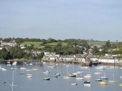 a bunch of boats are docked in a harbor at Florizel in Falmouth