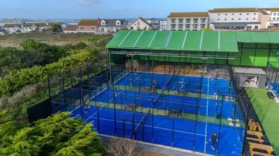 an overhead view of a building with a swimming pool at SeaSpace in Newquay