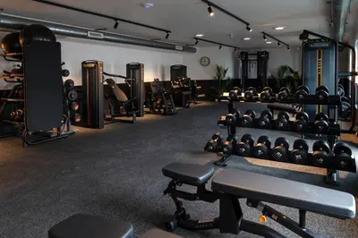 a gym with a lot of dumbbells at SeaSpace in Newquay