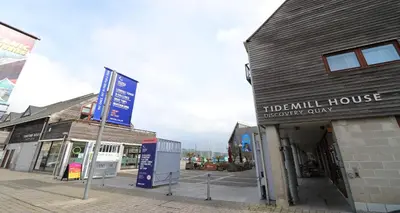 a building with a sign for a dental house at Yachtsmans Rest in Falmouth