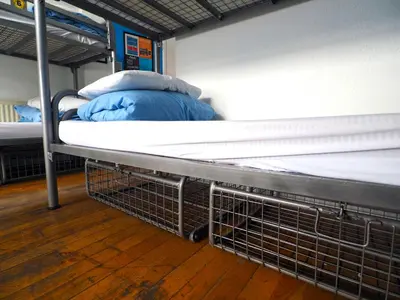 a room with two bunk beds in a room at St Christopher's Inn Newquay in Newquay