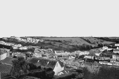 a black and white photo of a city with houses at Tregorran Guest House Mevagissey in Mevagissey