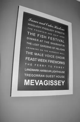 a framed picture of a sign on a wall at Tregorran Guest House Mevagissey in Mevagissey