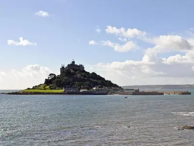 an island in the middle of a body of water at The Nest in Uny Lelant