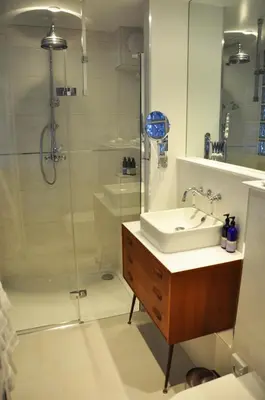 a bathroom with a sink and a shower at Trevose Harbour House in St Ives