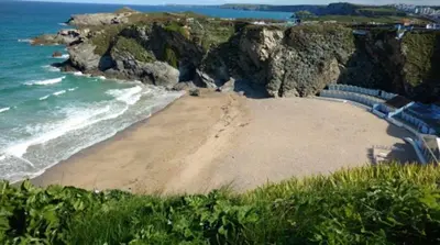 a view of a beach with rocks and the ocean at Luxury Holiday Caravan Home in Newquay