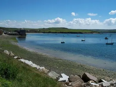 a large body of water with boats in it at Trelaze in Wadebridge