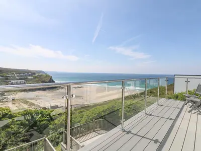 a balcony with a view of the ocean at St Ives View in Porthtowan