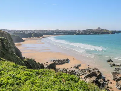 a view of a beach with people on the sand at Ocean Seven in Newquay