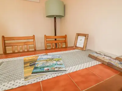 a table with magazines on top of a table at Chiffchaff in Padstow