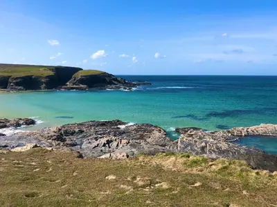 a view of a beach with rocks and the ocean at B47 Caravan Seven Bays in Padstow