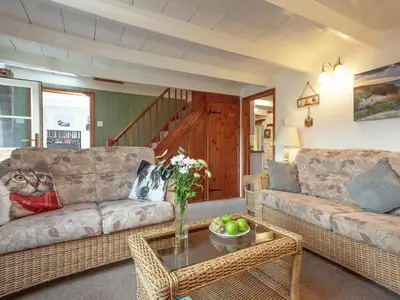a living room with a couch and a table at Greenbank Farm in Saint Dennis