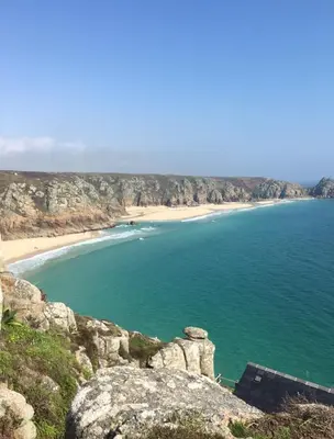 a view of a beach from a cliff at White Willows in Praa Sands