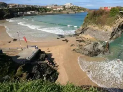 a view of a beach with the ocean at Bambu Cottage in Newquay