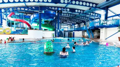 a group of people in a swimming pool at Hendra Holiday Park in Newquay
