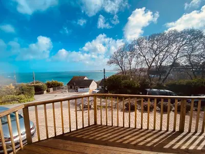 a deck with a view of the ocean at Little Coombe in St Ives