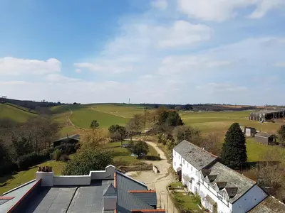 an aerial view of a house in a field at Great Trethew Manor Hotel & Restaurant in Menheniot