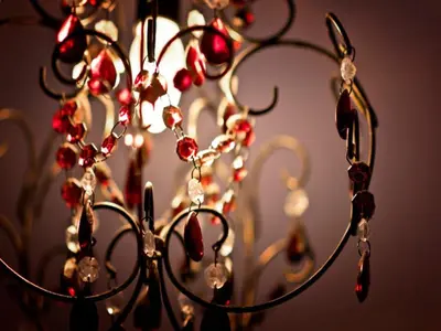 a metal chandelier with christmas decorations on it at Arches B&B in St Austell
