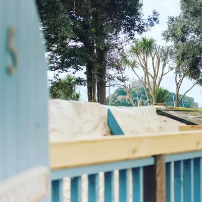 a pile of sand on top of a building at Sandpiper, apartment across from the beach in Marazion