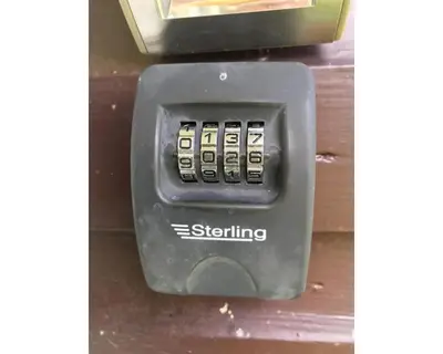 an electronic device with a stering button on a wall at Villa 7 Lanteglos, Camelford, Cornwall in Camelford