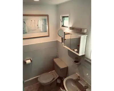 a bathroom with a toilet and a sink at Villa 7 Lanteglos, Camelford, Cornwall in Camelford