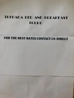 a sign that reads tibaa erd and benefit fund for the best rates at Tredara Bed & Breakfast in Truro