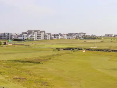 a view of the green at a golf course at 8 Cribbar in Newquay
