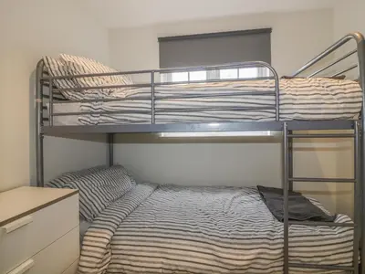 a bedroom with two bunk beds in a room at Cherrywood Manor in Bodmin