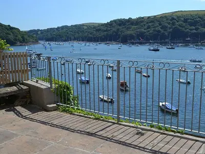 a view of a river with boats in the water at Roadstead in Fowey
