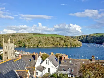 a view of a town with boats in the water at Chyandour in Fowey