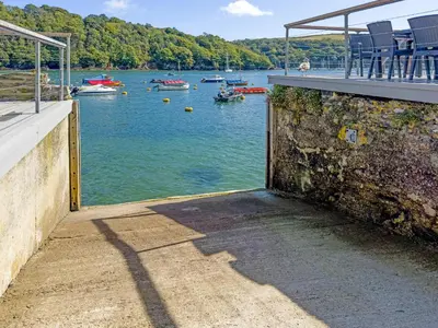 a view of a body of water with boats in it at Lower Deck in Fowey