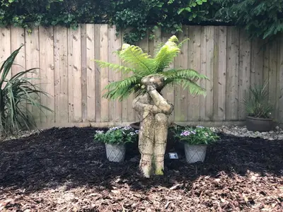 a statue of a person holding a palm tree at Beach Road- short walk to Charlestown, Carlyon Bay & coastal paths- dog friendly in Carlyon Bay