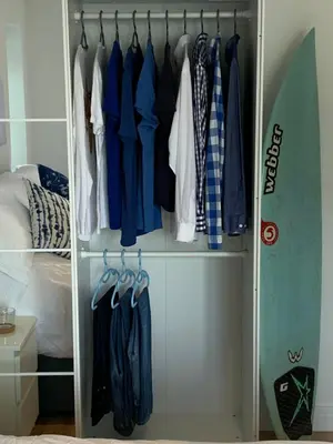 a closet filled with lots of clothes at Waves at The Beach House in Falmouth