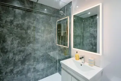 a bathroom with a sink and a shower at Finest Retreats - Luxury Holiday Let in Porthleven, Sleeping 2 in Porthleven