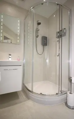 a shower with a glass door in a bathroom at Golden Hind in St Ives